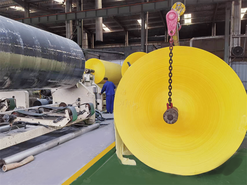 yellow jombo roll of paper tissue in factory
